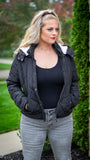 Looking for a "goes with anything" kinda jacket ? Look no further! We love the classic black quilted pattern this coat paired with snap close pockets, double zipper/snap front closure and lined fuzzy hood. The cropped length hits right below the belt line and offers the perfect warm relaxed fit. Pair this jacket with a cute scarf , mittens and a beanie to keep warm this fall/winter.  Color: Black