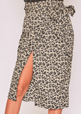 Leopard Wrap Skirt 6/11 - Fate & Co. Show off your wild side this season with this fun, comfortable wrap skirt. You'll love the mid-calf length and authentic animal print on this easy-to-wear piece. The thick waistband with bow tie is slimming and gives just the right amount of coverage for those days you're feeling bolder than usual. It's perfect to wear with any blouse or t-shirt in your wardrobe, matched with your favorite pumps! 