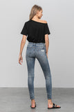 The Stella: Mid-Rise Distressed Skinny Jeans