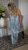 Simple Pleasures Draped Cami Maxi Dress w/Pockets - Dusty Blue/Gray - Fate & Co. We can only describe this dress by saying its like wearing your pajamas as a dress! Soft, smooth and ULTRA comfortable this dress feels like butter on your body. Featuring a soft round neckline, adjustable spaghetti straps and of course...pockets! Pair with your favorite sandals and messy bun for a fun and fashionable summer look!  65% Polyester 35% Rayon  Color: Dusty Blue/Gray  Available in sizes: S, M, L
