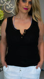 Back to Basic Henley Four Button Tank - Black - Fate & Co. We are going back to basics! We love how effortlessly versatile our Four Button Henley tank is. Featuring a fitted silhouette, four button front, contrast stitching and exposed detail, this tank is the perfect layering piece under your favorite cardigan, or it look great alone! Pair it with your favorite bottoms and bralette for a comfortable and casual look!   Color: Black  60% Polyester 32% Cotton 8% Spandex