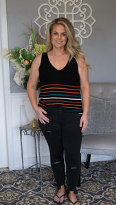 Forever Young Striped Knit Tank Top - Fate & Co. We LOVE this lightweight and fun multi-color striped tank! Featuring a super soft black knit fabric ,cute and colorful multi stripe mid detail, sexy v-neck and a slim fit silhouette, this top looks incredible on all body shapes and sizes. Tuck in or wear it out paired with your favorite denim and sandals! We featured it with our Julia Vervet by Flying Monkey shark bite black jeans. 
