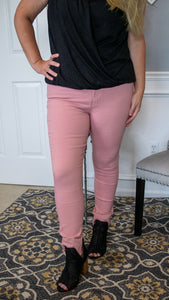 Add a little extra pop to your day to day wardrobe with our Rose Smoke high waisted super stretch jegging. Featuring a button front and zipper closure , it’s like your jeans and leggings had a baby! Lightweight and ultra stretchy these bottoms pair beautiful with any solid neutral top ! 