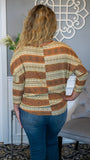 Aztec print is all the rage this fall and we are excited to jump on board with this fun new top! Featuring a soft boat neckline, dolman 3/4 length sleeve and earth tone aztec pattern , this relaxed fit top will be a definite go-to in your fall/winter collection! Pair with any light or dark wash denim jeans and booties for a fresh , fun a stylish look!   Made in USA