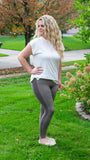 Leggings are the new pants, and we want you to look and feel your best when wearing them! Our "On the Run"  high waisted seamless leggings are featured in both Cocoa Brown and Black , offer ultimate stretch and comfort and have some fun ribbed detail down the side of the legs for a shift of texture! Pair with any oversized sweater or hoodie and your tennis shoes for a comfortable take on the day look!   Color: Cocoa Brown