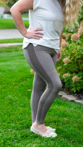Leggings are the new pants, and we want you to look and feel your best when wearing them! Our "On the Run"  high waisted seamless leggings are featured in both Cocoa Brown and Black , offer ultimate stretch and comfort and have some fun ribbed detail down the side of the legs for a shift of texture! Pair with any oversized sweater or hoodie and your tennis shoes for a comfortable take on the day look!   Color: Cocoa Brown