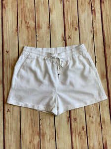 Linen Type Waistband Shorts with String Tie - White + - Fate & Co. There is nothing better than a pair of linen shorts to throw on in the summer. Our Daydream Linen shorts feature a relaxed fit, pull on elastic waistband, adjustable string tie and are available in multiple colors! Pair with a classic white tank or tee for an effortless summer look!  Color: White  55% Linen 45% Viscose